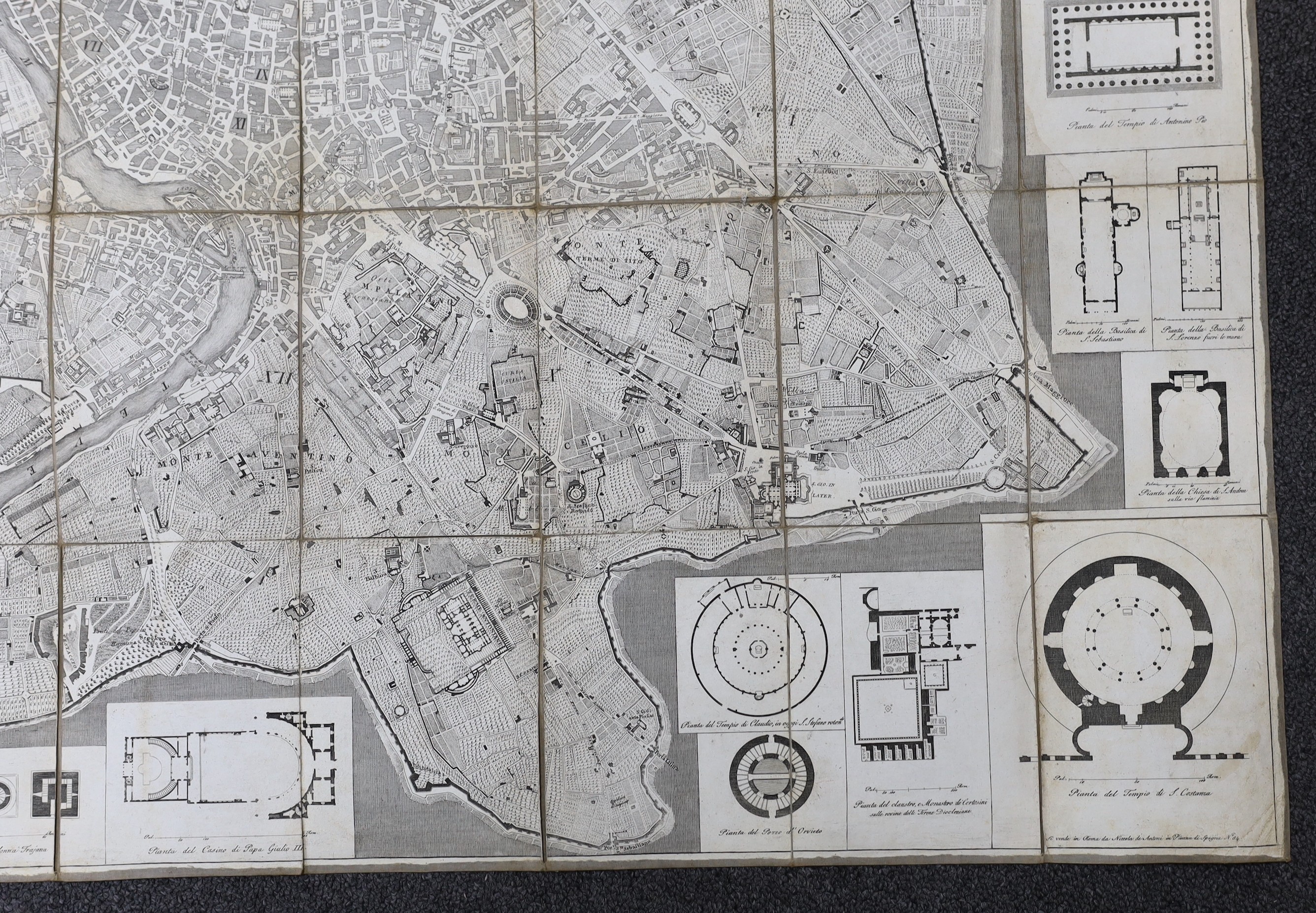 (Rome) Pianta Topgrafica dela Citta di Roma ... folded large scale plan, dissected and mounted on linen, engraved plans in surrounds, opens to approx. 44 x 82cms; some individual buildings and streets named, contained in